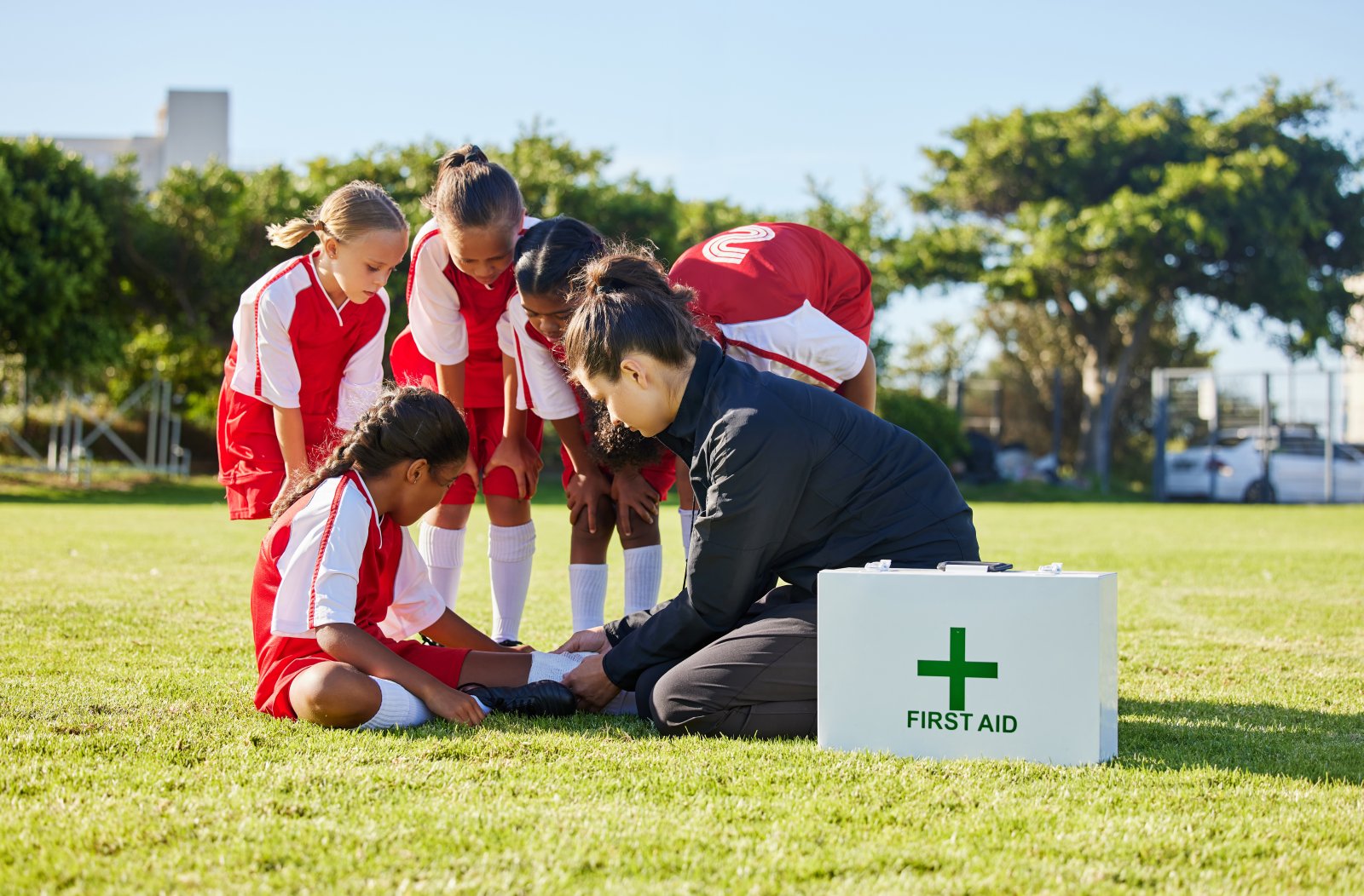 sports first aid and children soccer team with an 2023 11 27 05 12 28 utc